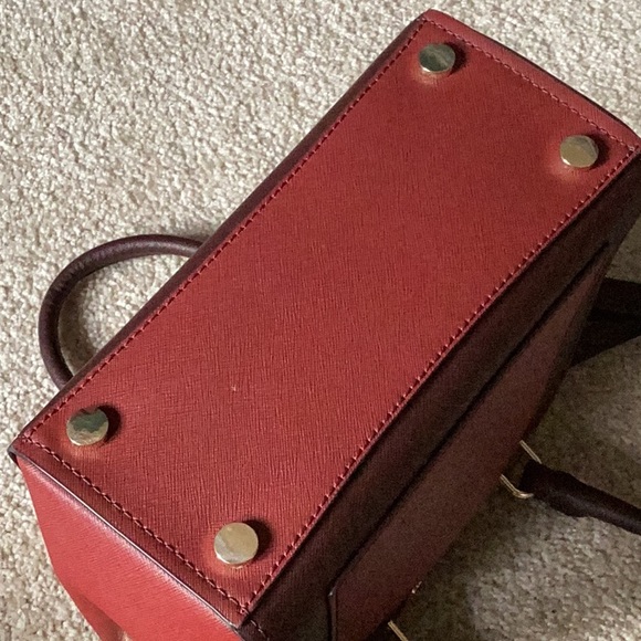 Michael Kors burgundy/brick colored handbag. - Picture 7 of 11